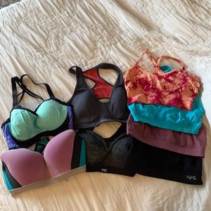 Lot of 8 size small (32D) Sports Bras!